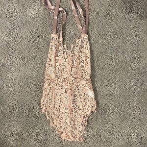 Pink lingerie bodysuit